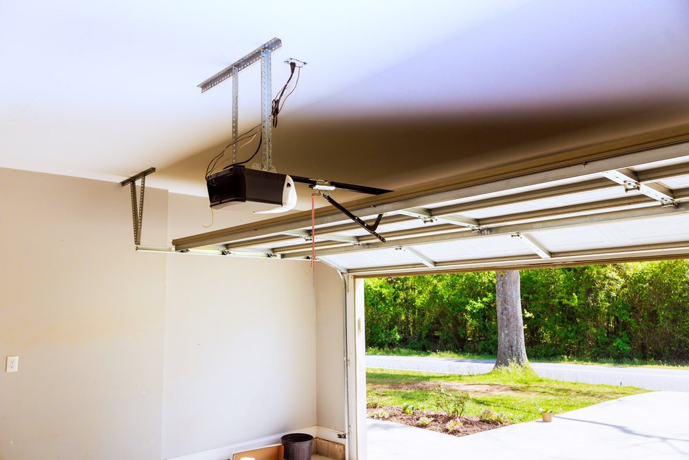 Garage,Door,Is,Open,,Revealing,Garage,Door,Opener,Mounted,On